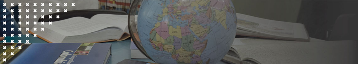 Imagen a manera de banner de libros y globo de mapa geográfico del planeta tierra para el programa de Negocios Internacionales de la Universidad de Ibagué